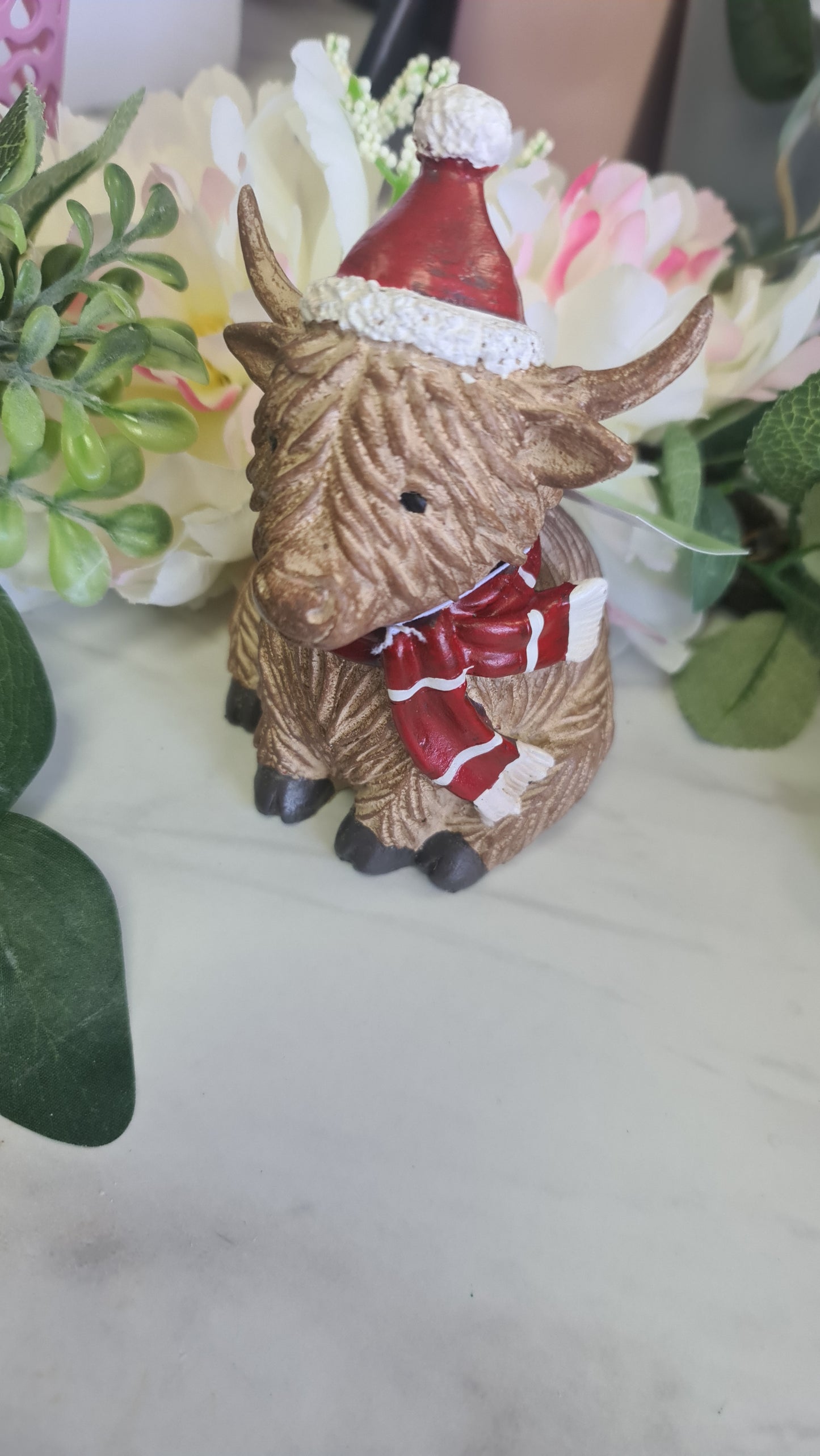 Sitting Highland Cow with Hat & Scarf