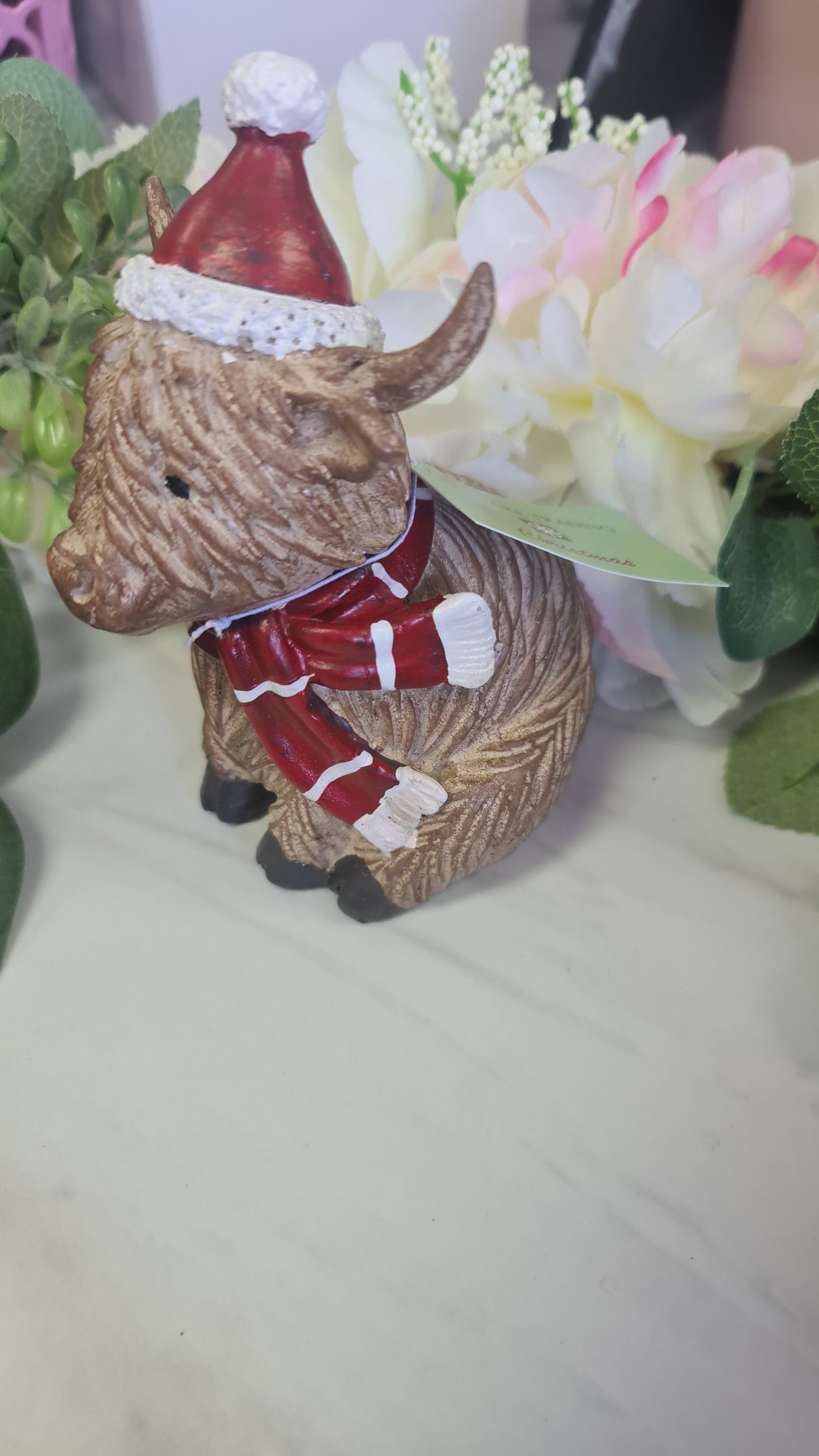 Sitting Highland Cow with Hat & Scarf