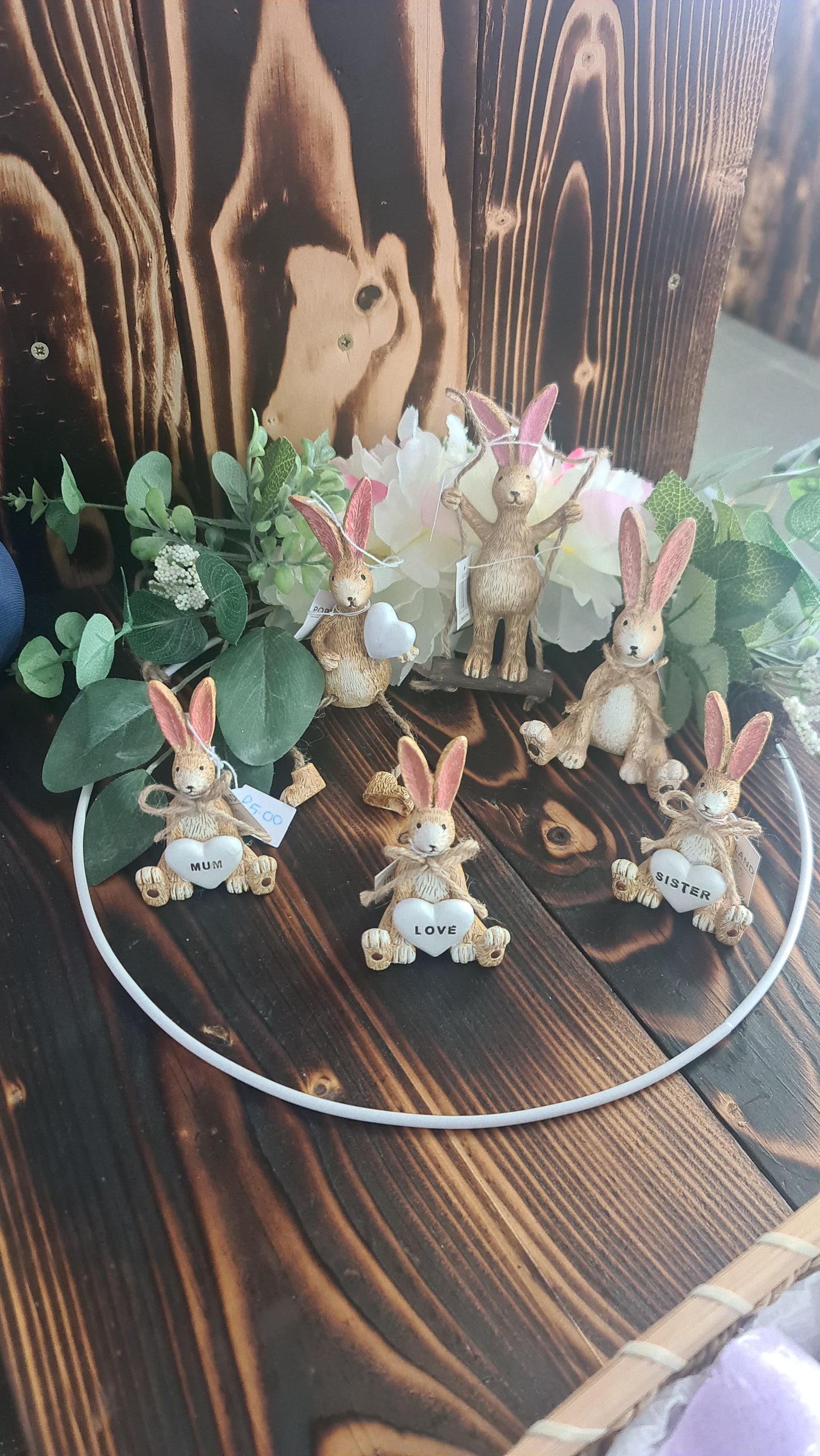 Bunny Holding rose behind Back