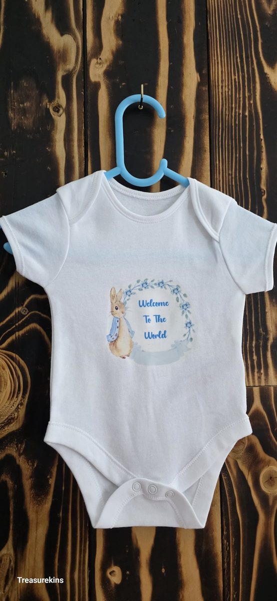 Blue Peter Rabbit blue welcome to the world baby vest