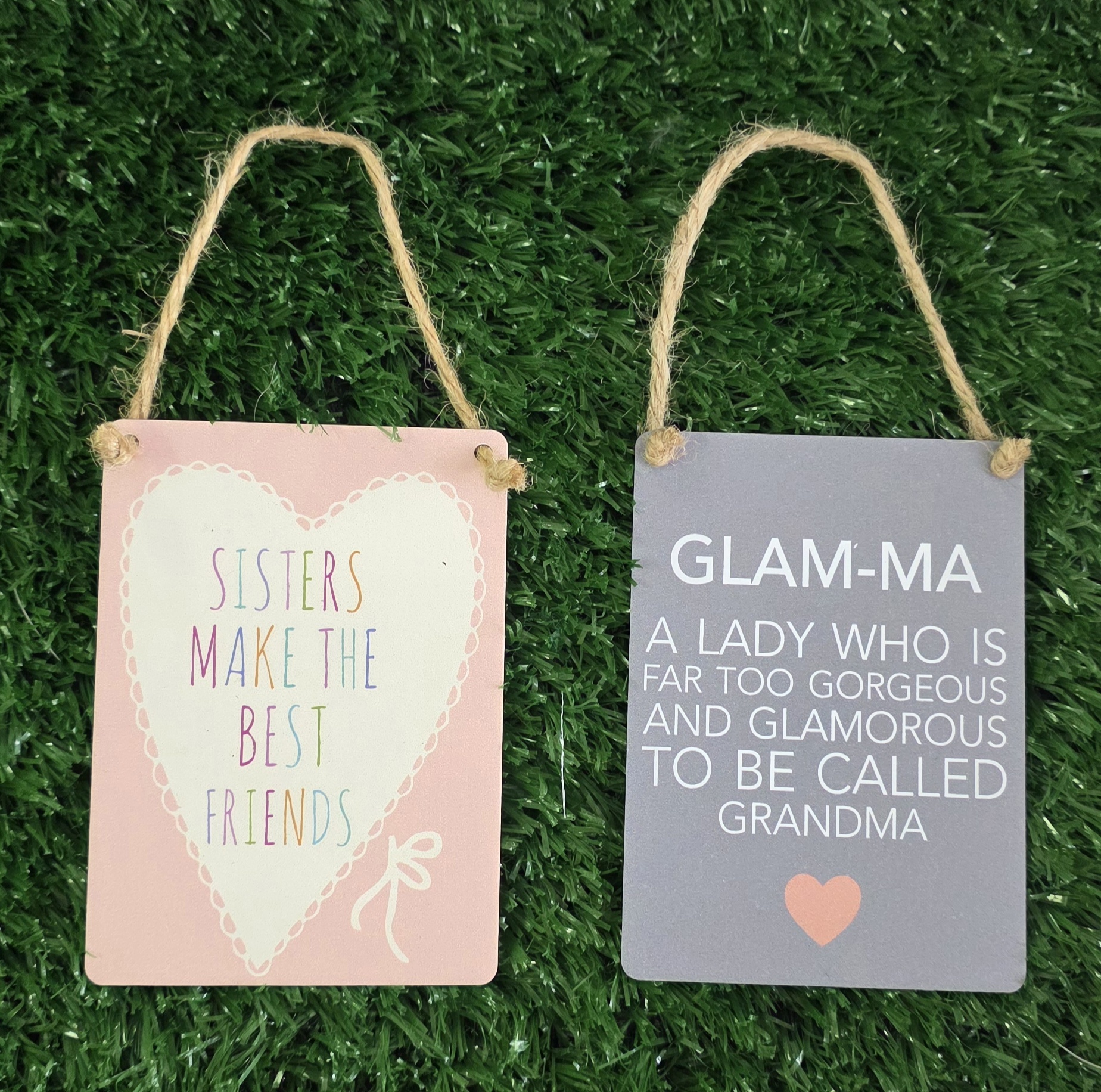 Mini Metal Hanging Plaque reading "SISTERS MAKE THE BEST FRIENDS"